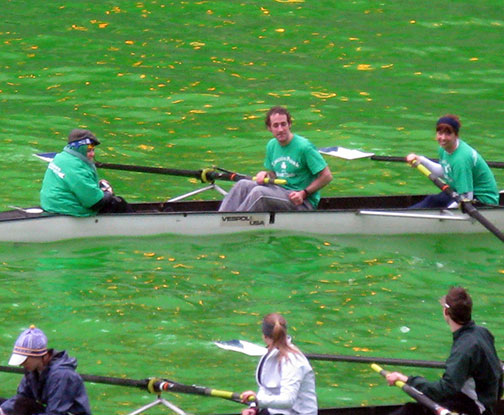 Rowers on a Chicago River dyed green for St. Patrick's Day, March 13, 2010