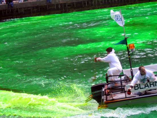 Pouring dye into the Chicago River to make it green for St. Patrick's Day